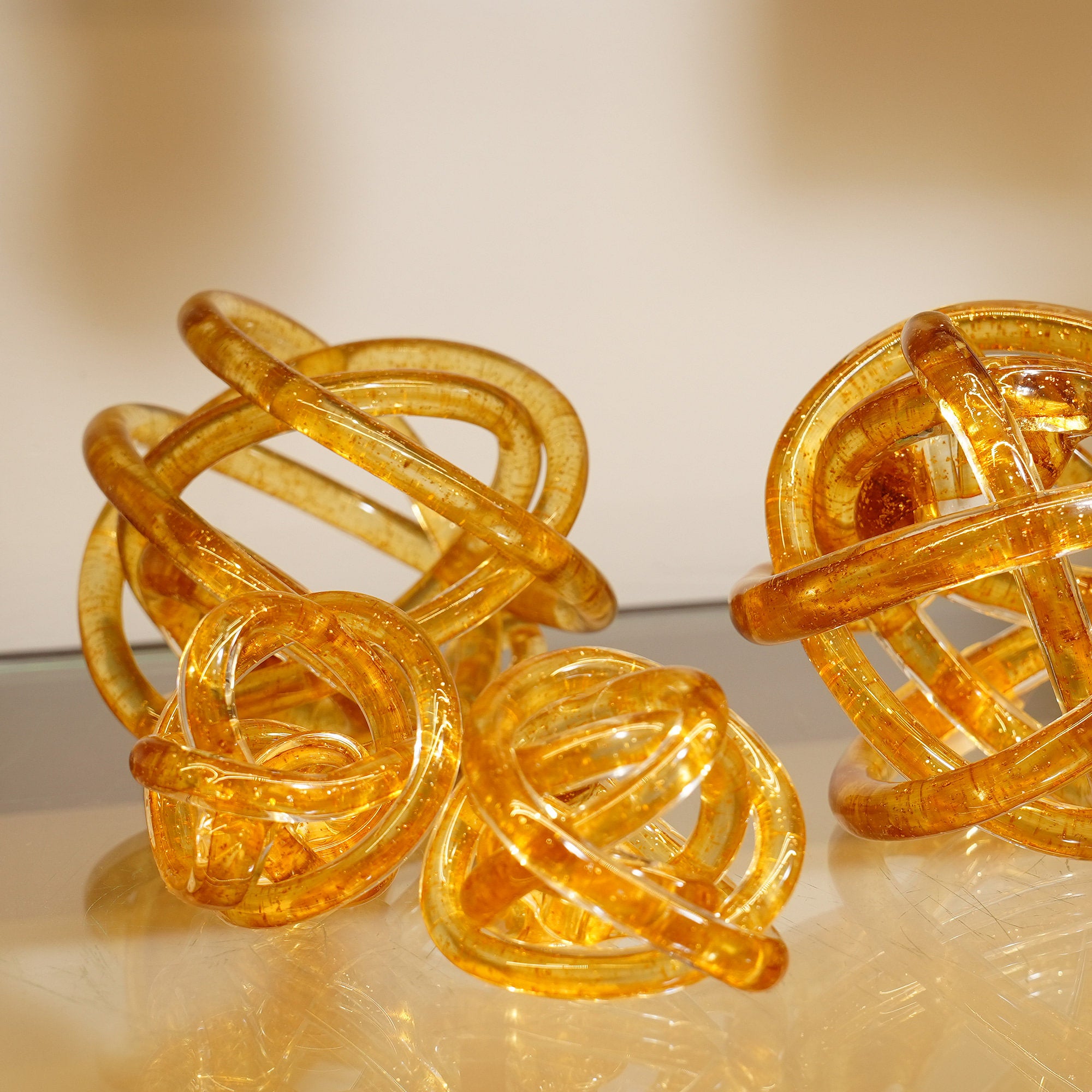 Zircon Infinity Knot Amber