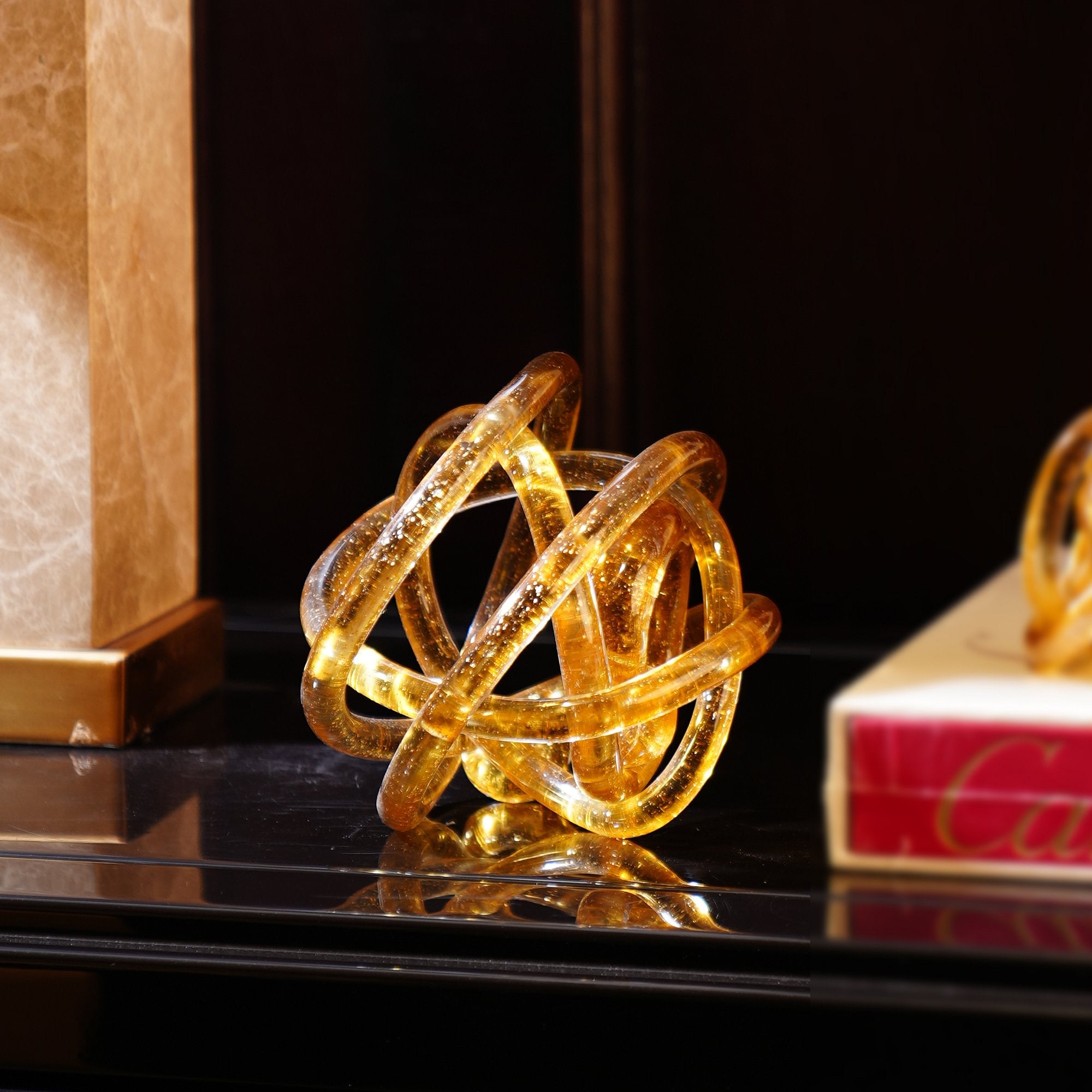 Zircon Infinity Knot Amber